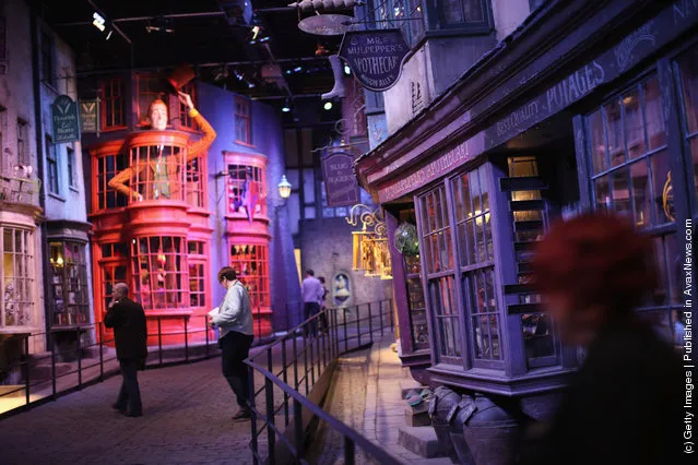 Visitors walk down Diagon Alley at the Harry Potter Studio Tour at Warner Brothers Leavesden Studios