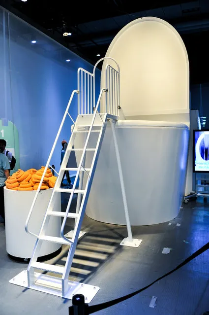 A giant toilet model is displayed during the “Toilet!? Human Waste and Earth's Future” exhibition at The National Museum of Emerging Science and Innovation – Miraikan on July 1, 2014 in Tokyo, Japan. The exhibition focuses on how the toilet has changed our daily lives and discovers what the most environment-friendly and ideal toilet is. (Photo by Keith Tsuji/Getty Images)