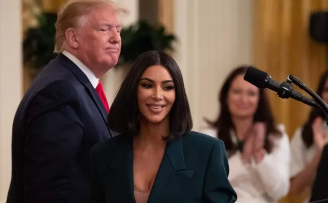 Kim Kardashian speaks alongside US President Donald Trump during a second chance hiring and criminal justice reform event in the East Room of the White House in Washington, DC, June 13, 2019. (Photo by Saul Loeb/AFP Photo)