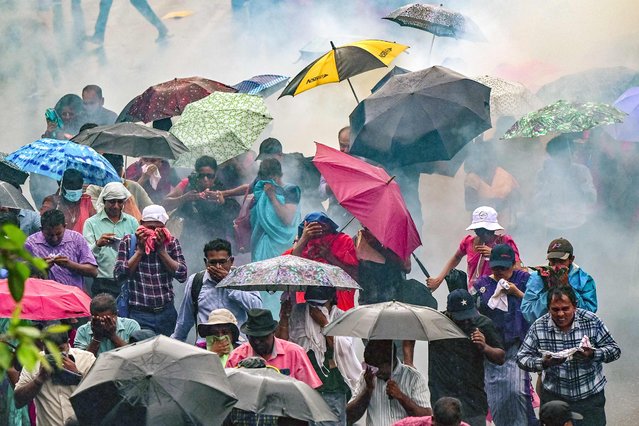 Police use water cannons and tear gas to disperse teachers and principals protesting against salary anomalies during an anti-government demonstration in Colombo on June 26, 2024. (Photo by Ishara S. Kodikara/AFP Photo)