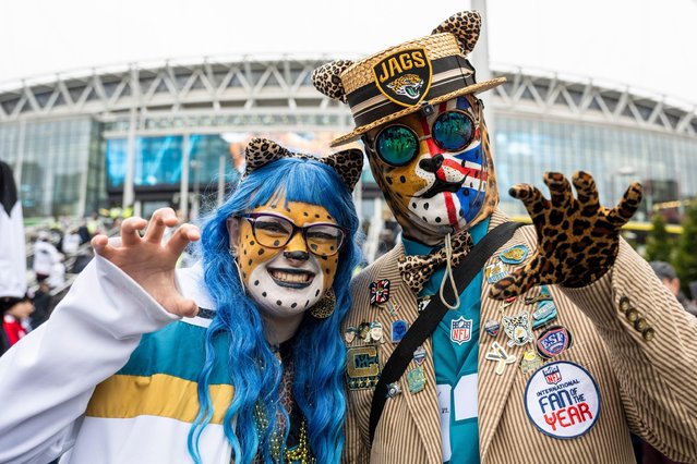 Jacksonville Jaguars fans on October 20, 2024 arrive on Olympic Way ahead of the Jacksonville Jaguars against the New England Patriots NFL game at Wembley Stadium, the final game in this year's NFL London Games series. (Photo by Stephen Chung/Alamy Live News)