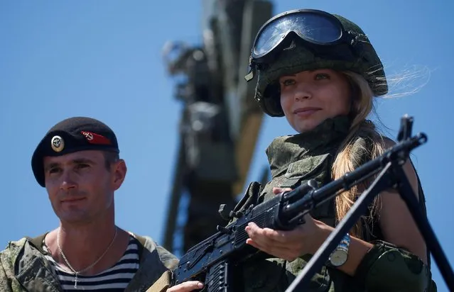 A blonde-haired female soldier pictured at the International Army Games 2017 at the Ashuluk shooting range outside Astrakhan, Russia August 5, 2017. (Photo by Maxim Shemetov/Reuters)