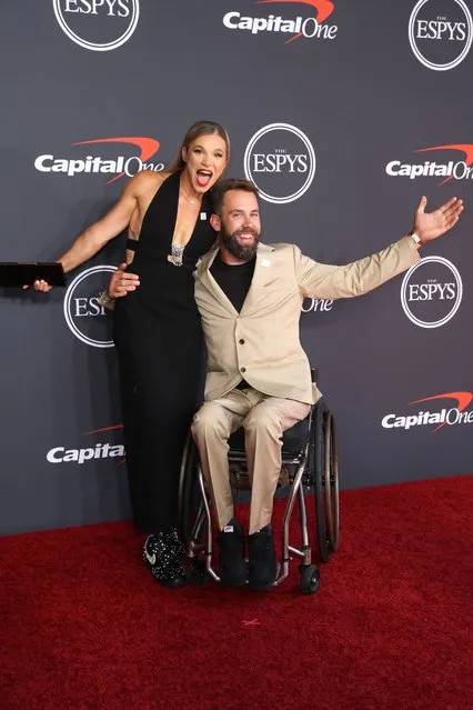 US paralympic athlete Oksana Masters (L), and US olympic athlete Aaron Pike (R), attend the 2022 ESPY Awards, at the Dolby Theatre in Los Angeles, California, USA, 20 July 2022. The US broadcast television network (ABC), present awards to recognize individual and team athletic achievements and other sports-related performances from the past year. (Photo by Caroline Brehman/EPA/EFE)