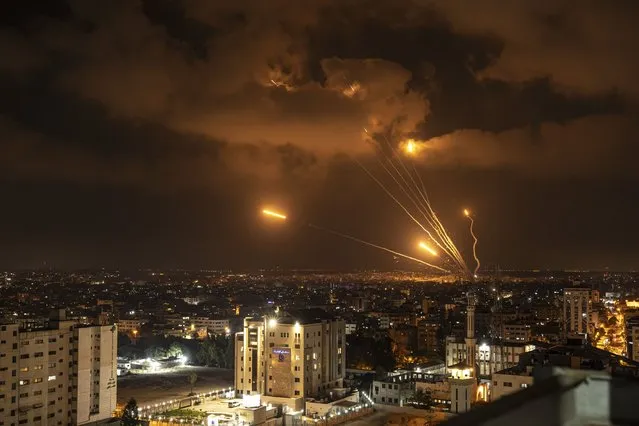 Rockets fired by Palestinian militants toward Israel, in Gaza City, Friday, August 5, 2022. Palestinian officials say Israeli airstrikes on Gaza have killed at least 10 people, including a senior militant, and wounded 55 others. (Photo by Fatima Shbair/AP Photo)