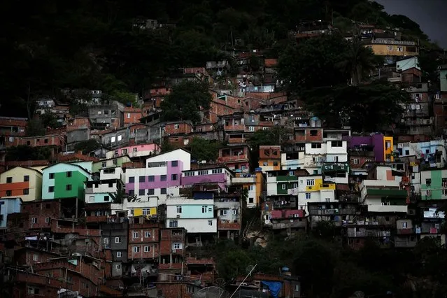 The Santa Marta favela, one of Rio's oldest slums, is seen on December 3, 2009 in Rio de Janeiro, Brazil. Santa Marta is one of a number of favelas where police are attempting a softer touch by participating in community policing after they clear the area of drug gangs. (Photo by Spencer Platt/Getty Images via The Palm Beach Post)