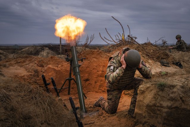 Soldiers of Ukraine's National Guard 1st brigade Bureviy (Hurricane) practice during combat training at a military training ground in the north of Ukraine Wednesday, November 8, 2023. (Photo by Efrem Lukatsky/AP Photo)