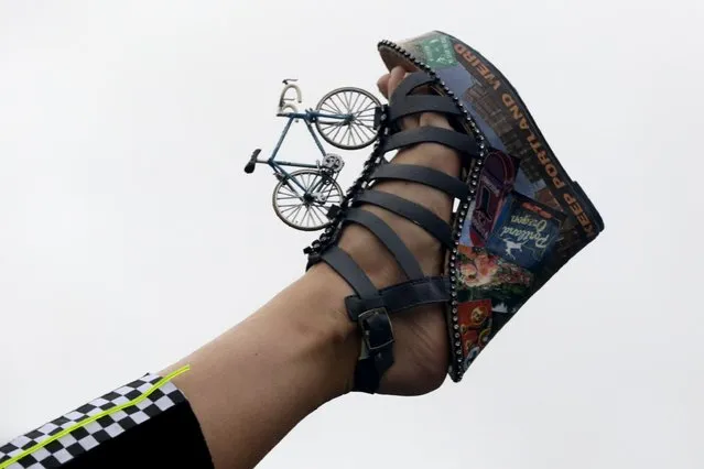 Miss Oregon Rebecca Anderson displays her shoe during the Miss America Shoe Parade at the Atlantic City boardwalk, Saturday, Sept. 13, 2014, in Atlantic City, N.J. (Photo by Julio Cortez/AP Photo)