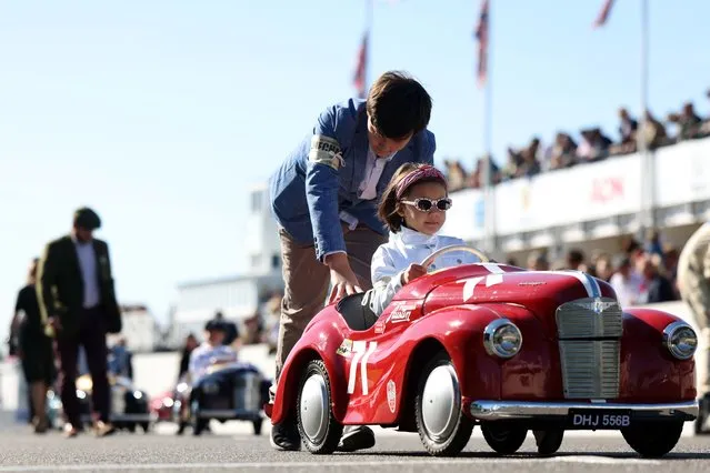 Young drivers prepare for the Settrington Cup during the Goodwood Revival 2022 at Goodwood Motor Circuit in West Sussex on Saturday, September 17, 2022. (Photo by Matt Alexander/PA Wire Press Association)