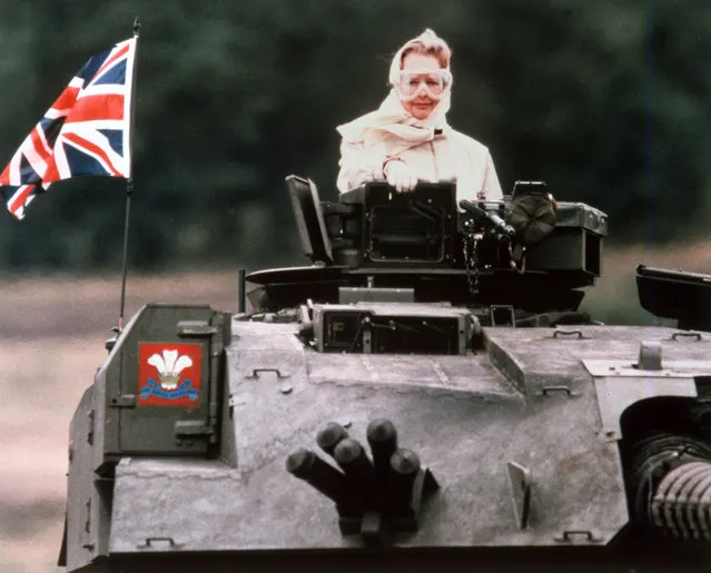 British prime minister, Margaret Thatcher, rides aboard a British tank at Fallingbostel, West Germany, September 17, 1986. Mrs. Thatcher was making an official visit to  British forces. (Photo by Joel Fink/AP Photo)