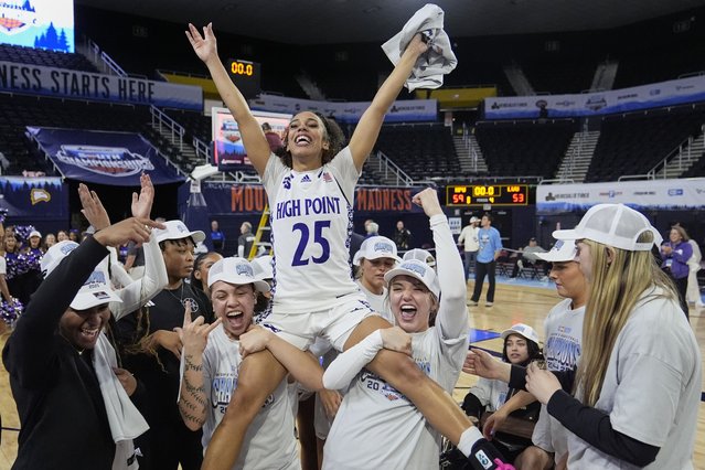 High Point guard Aaliyah Collins (25) celebrates with teammates after winning the Big South Championship NCAA college basketball game against Longwood, Sunday, March 9, 2025, in Johnson City, Tenn. (Photo by George Walker IV/AP Photo)