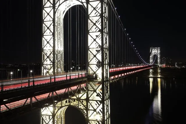 George Washington Bridge is illuminated on Presidents' Day as seen from the Fort Lee Historic Park in Fort Lee of New Jersey, United States on February 21, 2022. (Photo by Tayfun Coskun/Anadolu Agency via Getty Images)