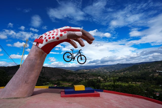The World's Largest Bicycle rises as a powerful tribute to Colombia's cycling soul in the rolling highlands of Tinjaca, Boyaca, Colombia on June 4, 2025. The monumental sculpture weaves local pride with the legacy of a country that lives and breathes cycling. (Photo by Juancho Torres/Anadolu via Getty Images)