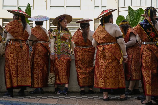 Indigenous Kejaman women gather before the Gawai Dayak Culture Parade in Kuching, capital of the Malaysian state of Sarawak on the island of Borneo, on June 21, 2025. (Photo by Mohd Rasfan/AFP Photo)