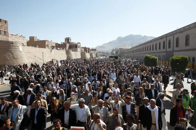 Mourners take part in the funeral of Abdul Qader Helal, the mayor of Sanaa, the capital Yemen who was killed by an apparent Saudi-led air strike that ripped through a wake attended by some of the country's top political and security officials in Sanaa, October 10, 2016. (Photo by Khaled Abdullah/Reuters)