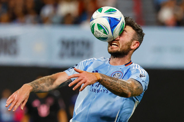 New York City FC midfielder Aiden O'Neill (21) heads the ball during the first half of a MLS soccer game against Inter Miami, Wednesday, September 24, 2025, in New York. (Photo by Noah K. Murray/AP Photo)
