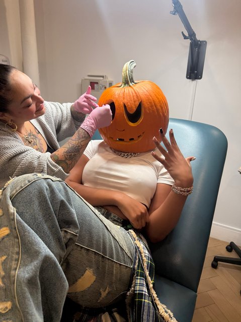 American rapper Megan thee Stallion on October 1, 2025 gets in the spooky spirit with a pumpkin on her head. (Photo by theestallion/Instagram)