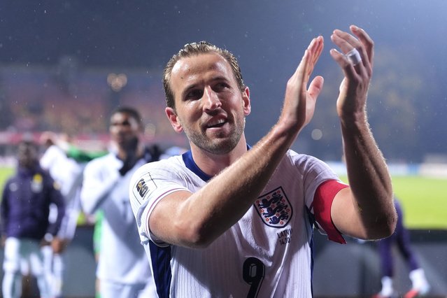 England's Harry Kane (centre) and team-mates applaud the fans following victory in the FIFA World Cup European Qualifying match at Daugava Stadium, Riga on Tuesday, October 14, 2025. England qualified for the 2026 World Cup after beating Latvia 5-0. (Photo by Bradley Collyer/PA Images via Getty Images)