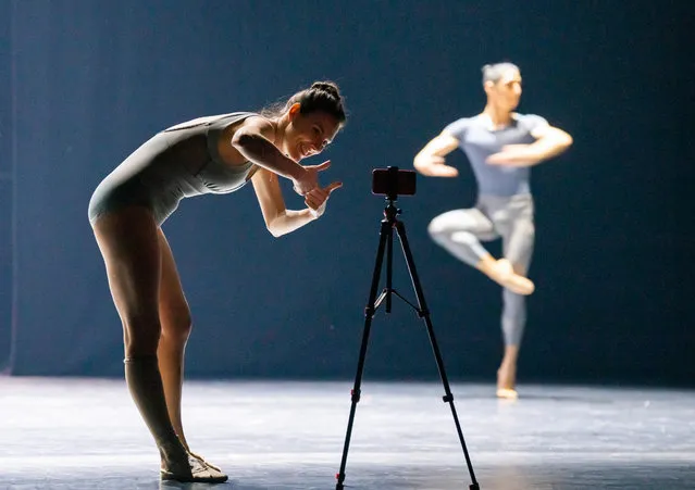 American ballet dancer Tiler Peck shows choreographer William Forsythe, via FaceTime, the rehearsals for his piece The Barre Project, Blake Works II in London, Britain early March 2023. (Photo by Tristram Kenton/The Guardian)