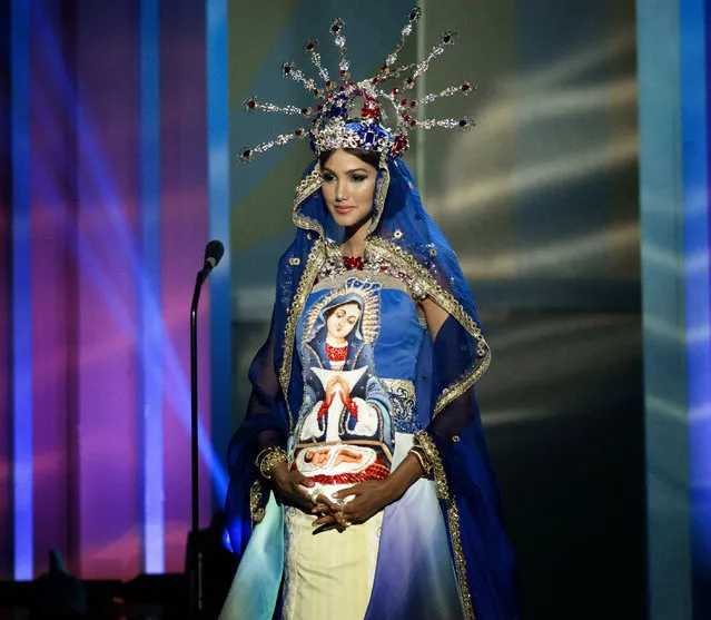 Miss Dominican Republic, Kimberly Castillo, poses for the judges, during the national costume show during the 63rd annual Miss Universe Competition in Miami, Fla., Wednesday, January 21, 2015. (Photo by J. Pat Carter/AP Photo)