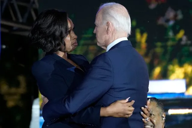 President Joe Biden talks with Jennifer Hudson following her performance during a Juneteenth concert on the South Lawn of the White House in Washington, Tuesday, June 13, 2023. (Photo by Susan Walsh/AP Photo)