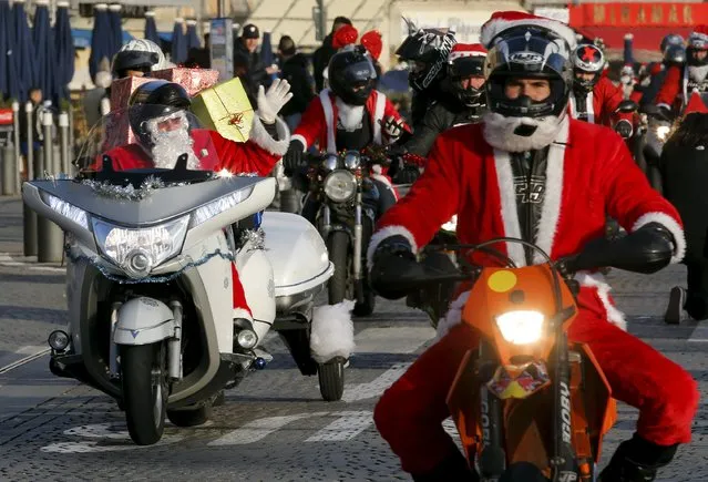 Bikers dressed as Santa Claus take part in a charity ride to bring gifts to hospitalized children in Marseille, France, December 20, 2015. (Photo by Jean-Paul Pelissier/Reuters)