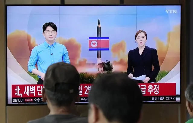 People watch a television reporting North Korea's missile launch during a news program at the Seoul Railway Station in Seoul, South Korea, Wednesday, July 19, 2023. North Korea fired two short-range ballistic missiles into its eastern sea early Wednesday in what appeared to be a statement of defiance as the United States deploys a nuclear-armed submarine to South Korea for the first time in decades. (Photo by Ahn Young-joon/AP Photo)
