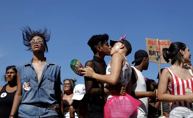 Revellers take part in the Gay Pride Parade at Copacabana beach in Rio de Janeiro, Brazil, September 30, 2018. (Photo by Ricardo Moraes/Reuters)