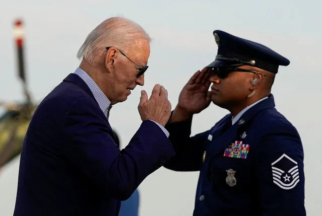 U.S. President Joe Biden salutes while boarding Air Force One as he departs for Philadelphia, Pennsylvania from Dover, Delaware, U.S., September 4, 2023. (Photo by Joshua Roberts/Reuters)