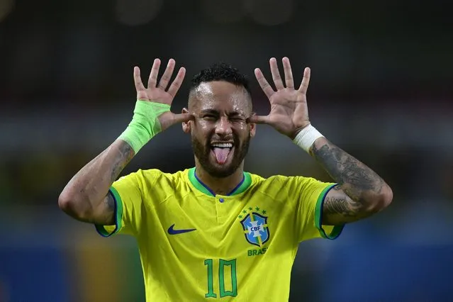 Brazil's forward Neymar celebrates after scoring a goal during the 2026 FIFA World Cup South American qualifiers football match between Brazil and Bolivia at the Jornalista Edgar Proença 'Mangueirao' stadium, in Belem, state of Para, Brazil, on September 8, 2023. Neymar became Brazil's all-time top scorer on Friday surpassing Pele's record. (Photo by Carl de Souza/AFP Photo)