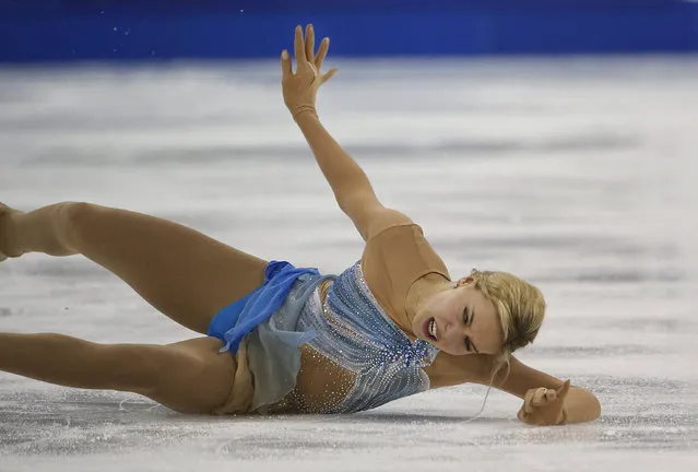 Anna Pogorilaya of Russia falls as she performs during the Ladies Short Program in the ISU World Figure Skating Championship 2015 held at the Oriental Sports Center in Shanghai, China, Thursday, March 26, 2015. (Photo by Ng Han Guan/AP Photo)