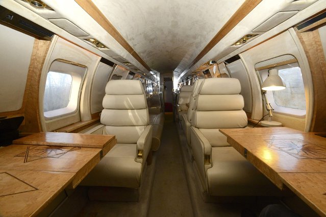 The inside of a luxury Jetstar private jet, built in the seventies and retaining most of the original features which is now being used as a holiday let is seen in Redberth, Pembrokeshire, Wales, January 11, 2017. Aviation enthusiasts have a novel way to feed their hobby without even taking to the skies – sleeping in a decommissioned private jet in Wales. With a double bedroom at the back and long leather sofa behind the cockpit, the 1970s JetStar sleeps 4 people on a campsite in Pembrokeshire. It joins a few other old planes – like a jumbo jet in Sweden – that have been converted into accommodation. Still bearing original features, the plane, which would have carried maximum nine passengers, comes with a bar area, an Xbox with flight games in the cockpit, a toilet and a cold water basin. “It ticks quite a few different people's boxes”, said Apple Camping owner Toby Rhys-Davies, who bought the jet from a salvage yard. “I've had all sorts of people staying from plane enthusiasts to people who are scared of flying and then just couples”. (Photo by Rebecca Naden/Reuters)