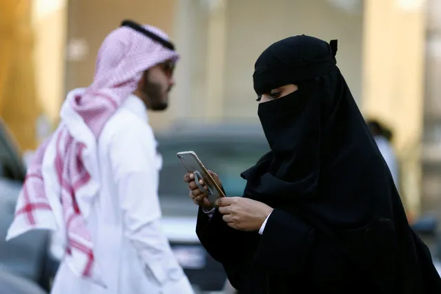 A Saudi woman uses the Careem app on her mobile phone in Riyadh, Saudi Arabia, January 2, 2017. (Photo by Faisal Al Nasser/Reuters)