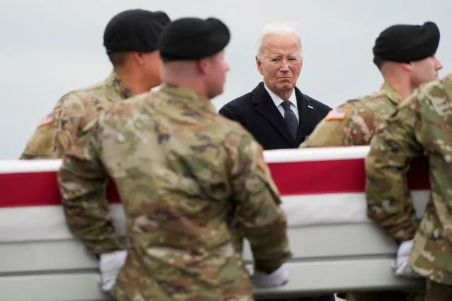 U.S. President Joe Biden attends the dignified transfer of the remains of Army Reserve Sergeants William Rivers, Kennedy Sanders and Breonna Moffett, three U.S. service members who were killed in Jordan during a drone attack carried out by Iran-backed militants, at Dover Air Force Base in Dover, Delaware, U.S., February 2, 2024. (Photo by Joshua Roberts/Reuters)
