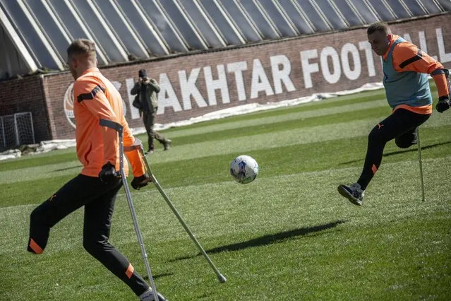 Disabled Ukrainian war-veterans are seen during the first training session of newly formed FC Shakhtar football team consisting of soldiers who were injured during hostilities and, as a result, had their limbs amputated. Accordingly to FC Shakhtar sources, an estimate of fifty-thousand servicemen in Ukraine currently have amputations due to injuries, Kyiv Oblast, Ukraine, March 11th, 2024. (Photo by Narciso Contreras/Anadolu via Getty Images)