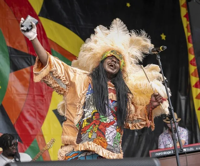 Honey Bannister of the Golden Sioux Mardi Gras Indians performs with Cha Wa during the New Orleans Jazz &amp; Heritage Festival on Thursday, April 25, 2024, at the Fair Grounds Race Course in New Orleans. (Photo by Amy Harris/Invision/AP Photo)