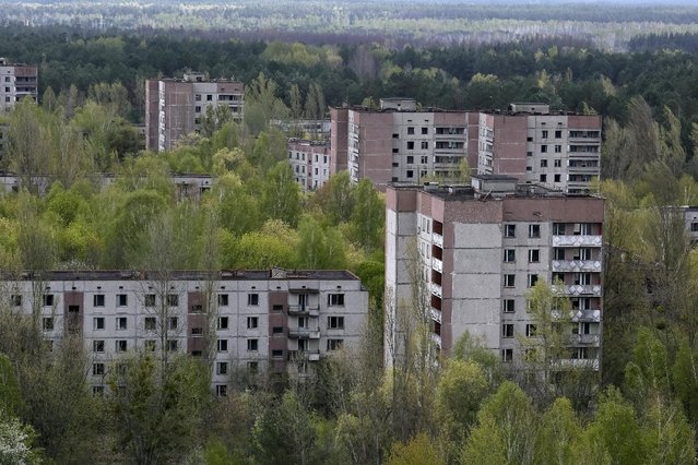 A view of the abandoned city of Pripyat is seen near the Chernobyl nuclear power plant in Ukraine April 22, 2016. (Photo by Gleb Garanich/Reuters)