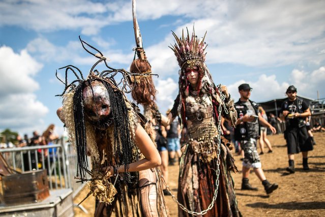Some of the revellers dress up in elaborate costumes at the world's largest heavy metal festival, the Wacken Open Air 2019, in Wacken, Germany on August 3, 2019. (Photo by Action Press/Shutterstock)