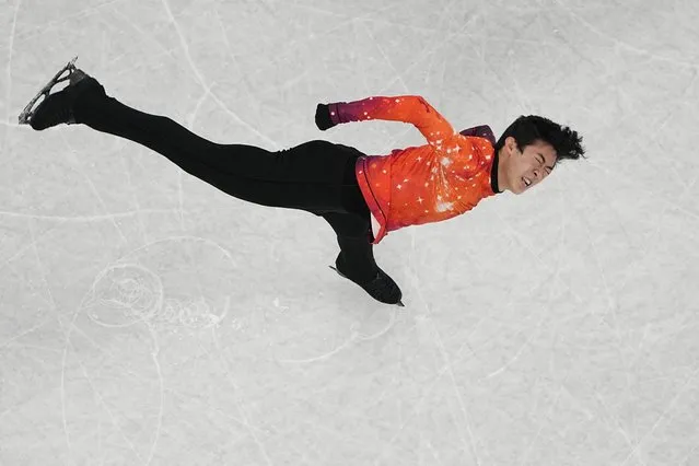 Nathan Chen, of the United States, competes in the men's free skate program during the figure skating event at the 2022 Winter Olympics, Thursday, February 10, 2022, in Beijing. (Photo by Jeff Roberson/AP Photo)