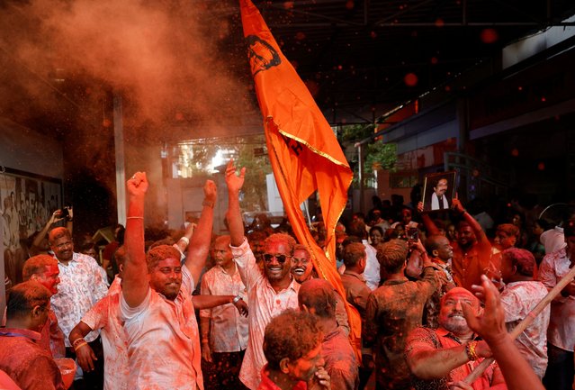 Shiv Sena (Uddhav Balasaheb Thackeray) supporters celebrate after election results outside the party office in Mumbai, India, on June 4, 2024. (Photo by Francis Mascarenhas/Reuters)