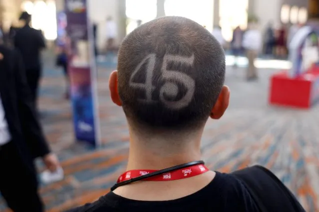 Adam Radogna, with the number 45 shaved on the back of his head to honor Donald Trump as the 45th President, is pictured during the Conservative Political Action Conference (CPAC) in Orlando, Florida, U.S. February 24, 2022. (Photo by Octavio Jones/Reuters)