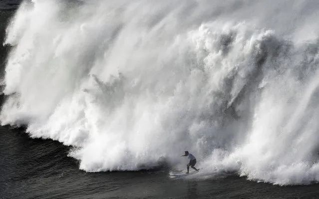 Spanish surfer Indar Unanue rides a wave during the 14th edition of the Big Wave surfing Punta Galea Challenge held in Getxo, Basque Country, Spain, 16 December 2019. (Photo by Miguel Tona/EPA/EFE/Rex Features/Shutterstock)