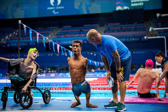 Paralympic athlete Santos Araujo, of Brasil, celebrates after winning at men's 200 m Freestyle -S2 final, during the 2024 Paralympics, Monday, September 2, 2024, in Paris, France. (Phoot by Emilio Morenatti/AP Photo)