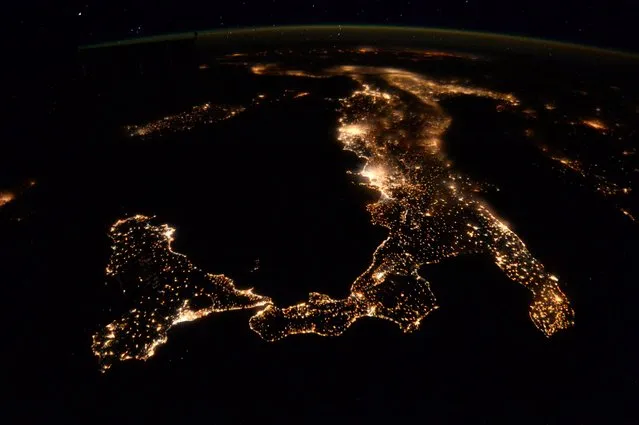 Tim Peake took this photograph of Italy with the caption: “Been some great night passes over Europe recently...I am waving!”. (Photo by Tim Peake/ESA/NASA)