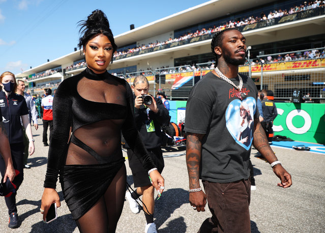 American rapper Megan Thee Stallion walks on the grid before the F1 Grand Prix of USA at Circuit of The Americas on October 24, 2021 in Austin, Texas. (Photo by Chris Graythen/Getty Images)