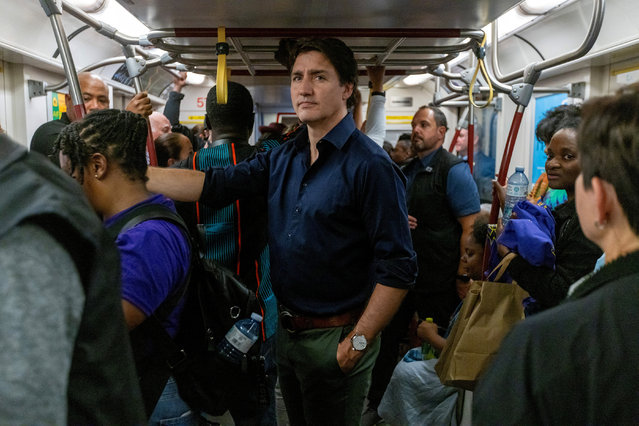 Canada's Prime Minister Justin Trudeau rides the subway during the TTC's annual Emancipation Day Underground Freedom Train Ride in Toronto, Ontario, Canada on July 31, 2023. (Photo by Carlos Osorio/Reuters)