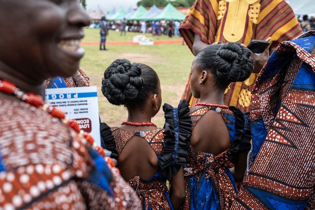 Twins look on as they attend the Igboora World Twins Festival 2024, in Igbo-Ora on October 12, 2024. (Photo by Olympia de Maismont/AFP Photo)