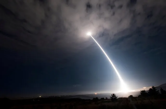 An unarmed Minuteman III intercontinental ballistic missile launches during an operational test at 2:10 a.m. Pacific Daylight Time at Vandenberg Air Force Base, California, U.S., August 2, 2017. (Photo by Senior Airman Ian Dudley/Reuters/U.S. Air Force)