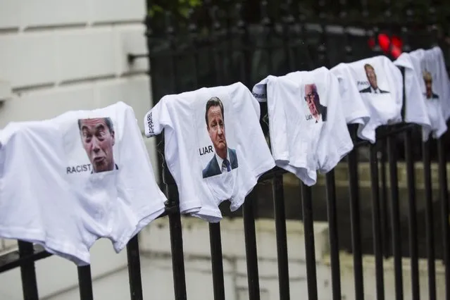 Underwear, featuring various politicians faces and slogans, are hung on a railing outside the home of former London Mayor Boris Johnson during a protest, July 1, 2016, in London. (Photo by Jack Taylor/Getty Images)