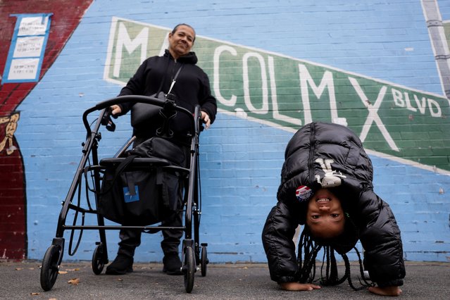 Theresa Thompkins stands on a street next to her daughter Briannalys Thompkins on Election Day in New York City on November 5, 2024 on November 5, 2024. (Photo by Kent J. Edwards/Reuters)