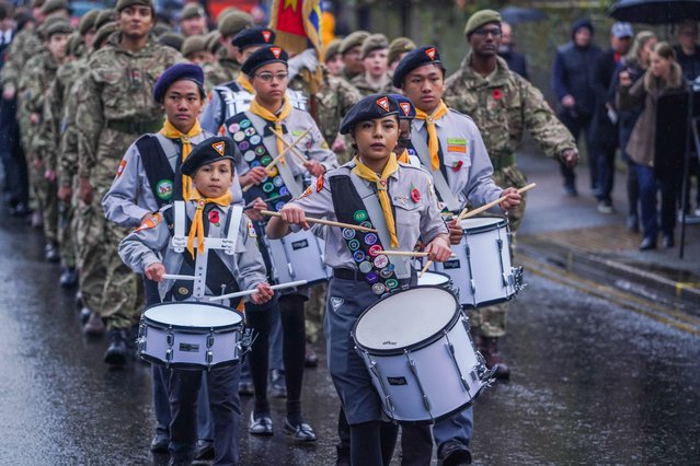 A cadet band marches through Wimbledon on Remembrance Sunday in London, UK on November 12, 2023. (Photo by Amer Ghazzal/Rex Features/Shutterstock)